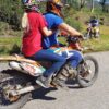 2 people on dirt Bike